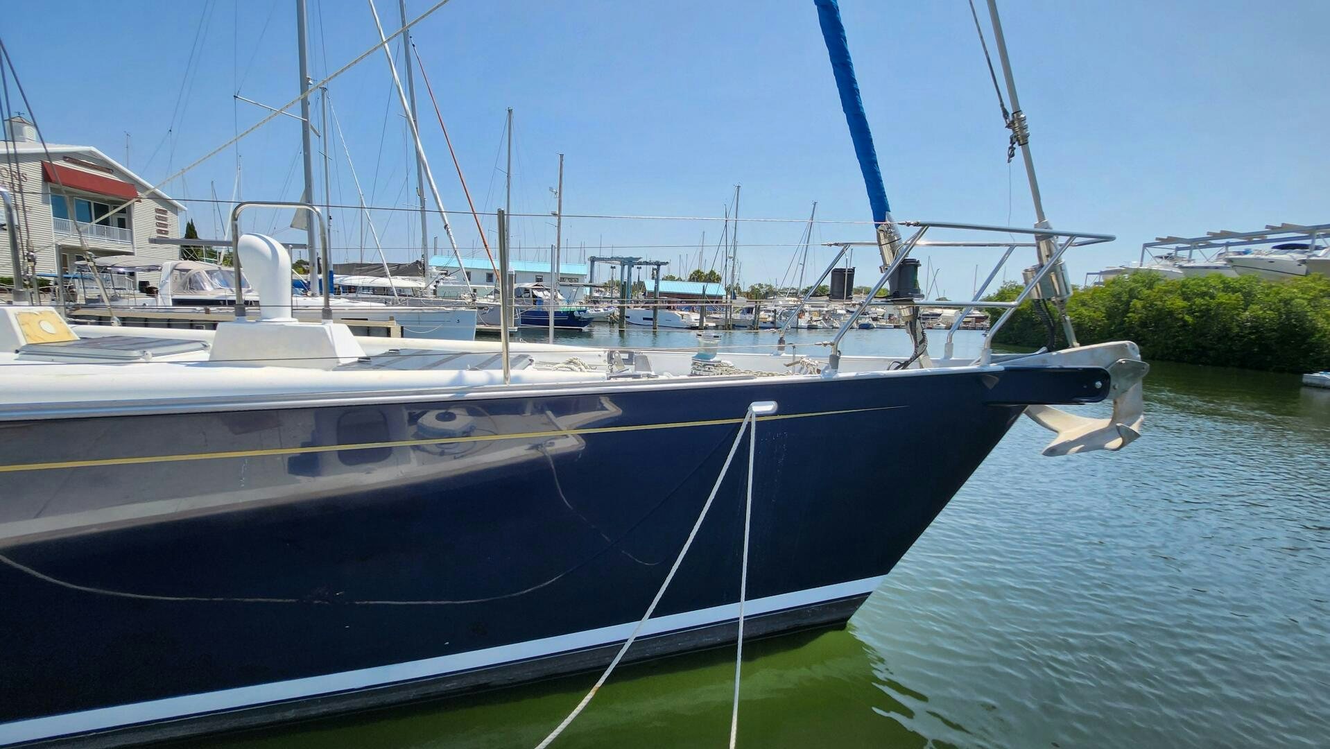 a boat tied to a dock aboard MAYA Yacht for Sale