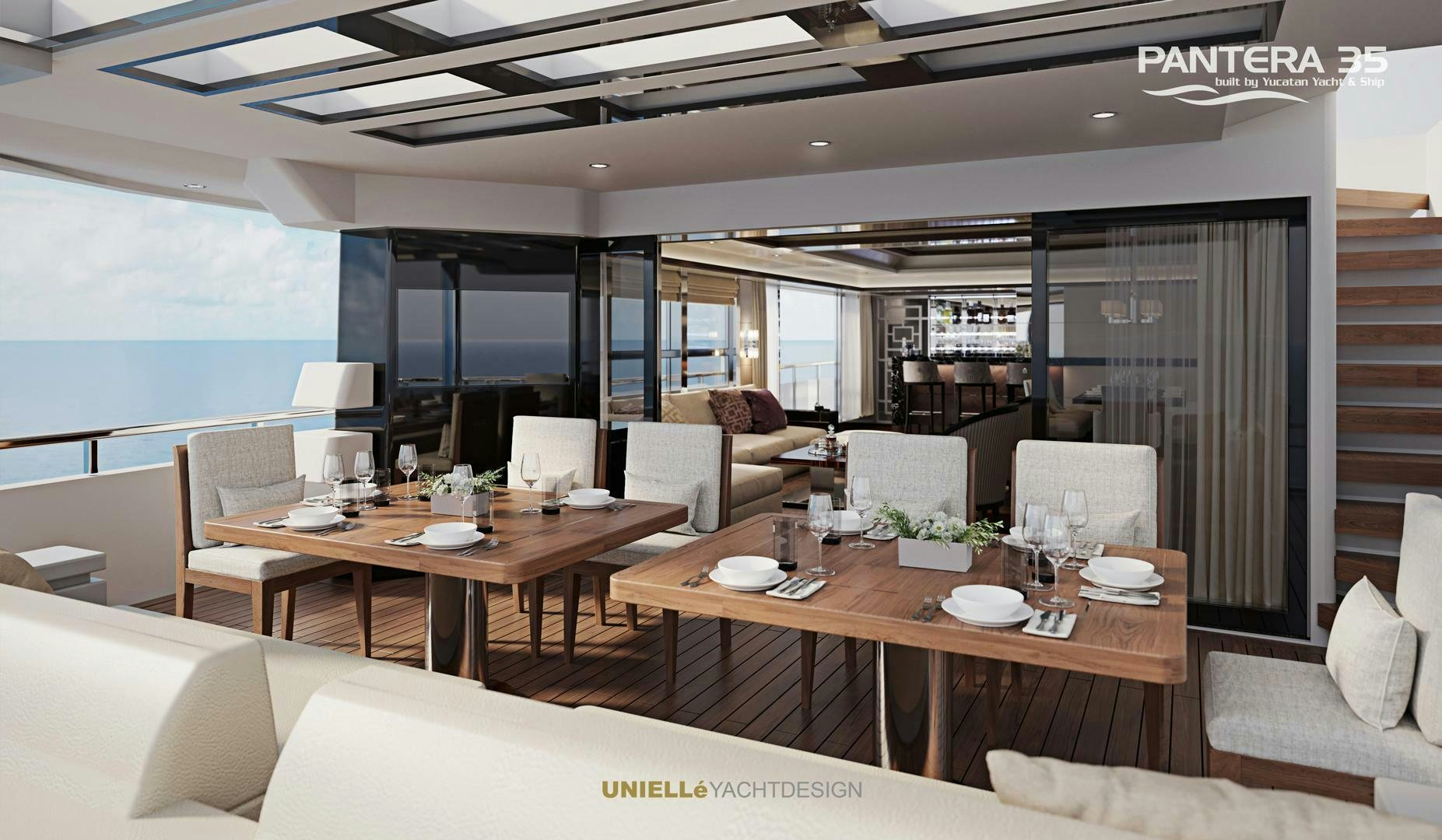 a room with a table chairs and a large window aboard PANTERA 35 Yacht for Sale