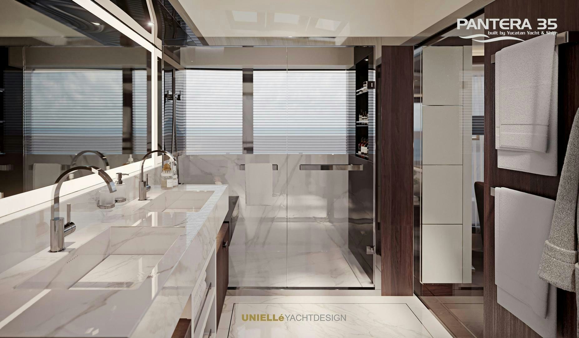 a bathroom with sinks and mirrors aboard PANTERA 35 Yacht for Sale