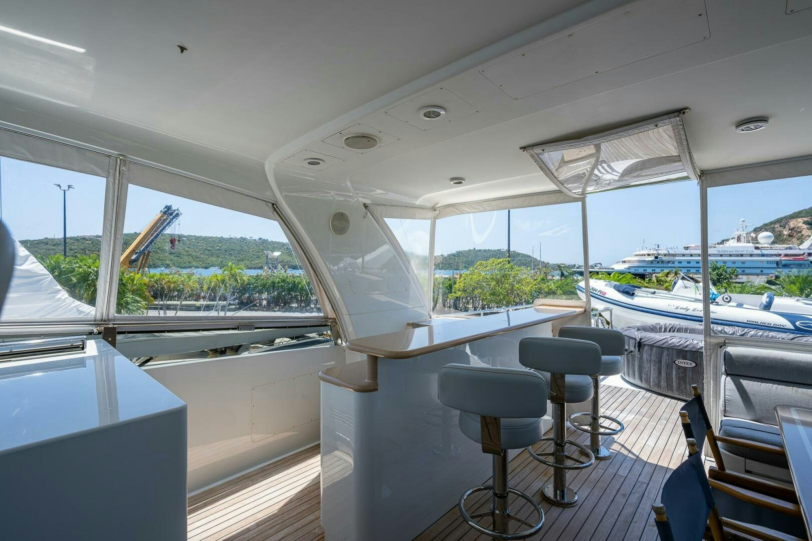 a boat with stools and stools aboard LADY LORRAINE Yacht for Sale