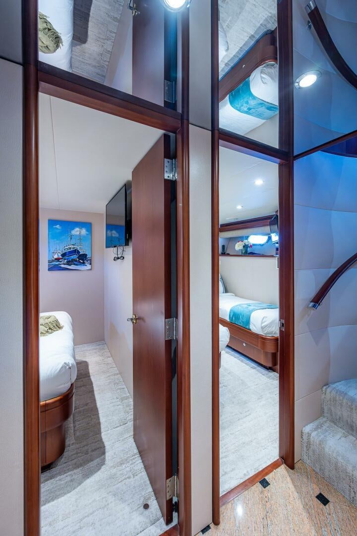 a bathroom with a glass door aboard LADY LORRAINE Yacht for Sale