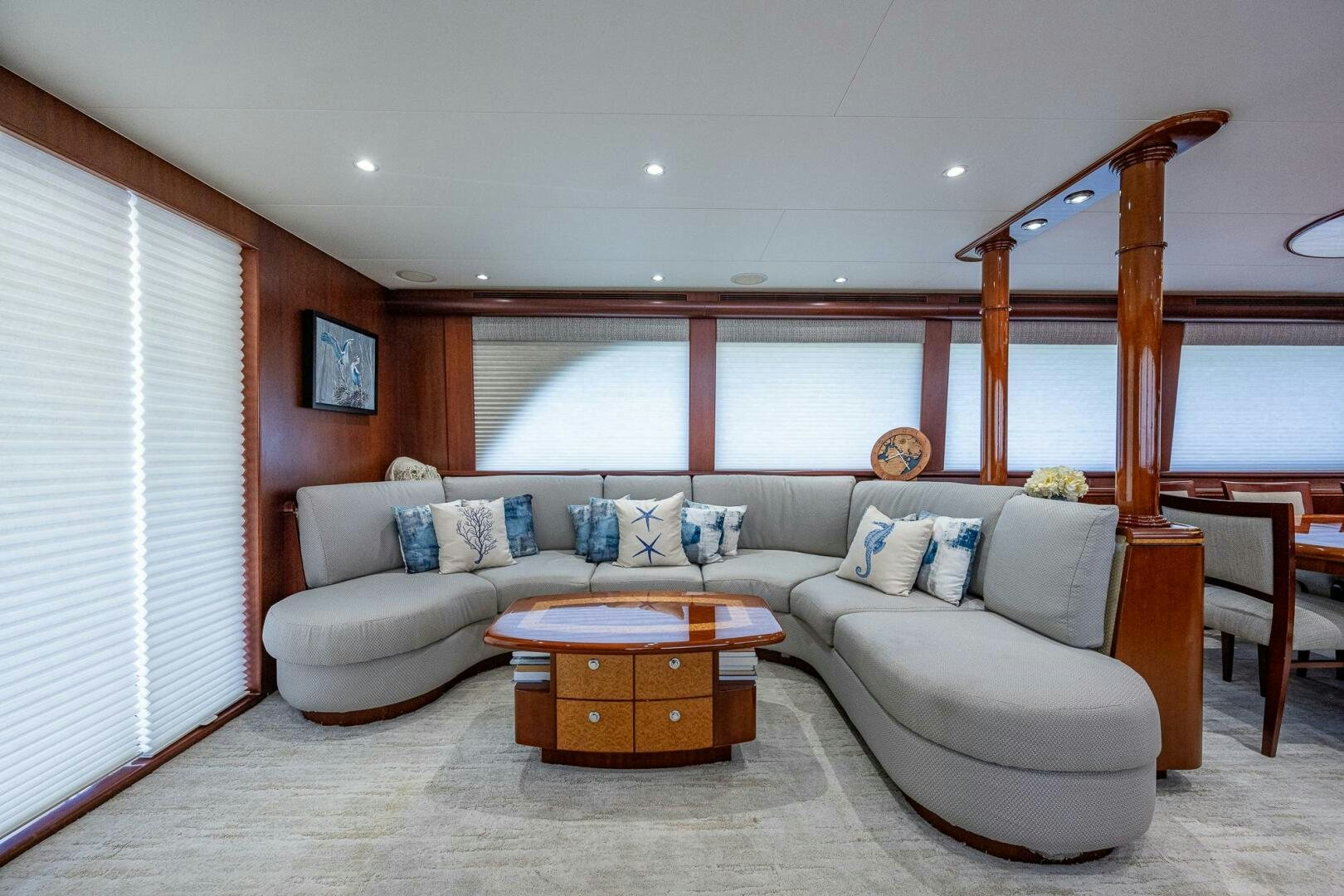 a living room with a large window aboard LADY LORRAINE Yacht for Sale