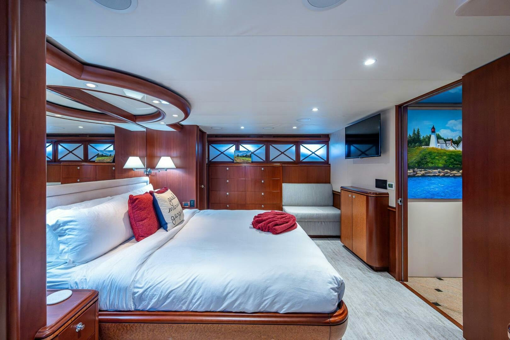 a bedroom with a large bed aboard LADY LORRAINE Yacht for Sale