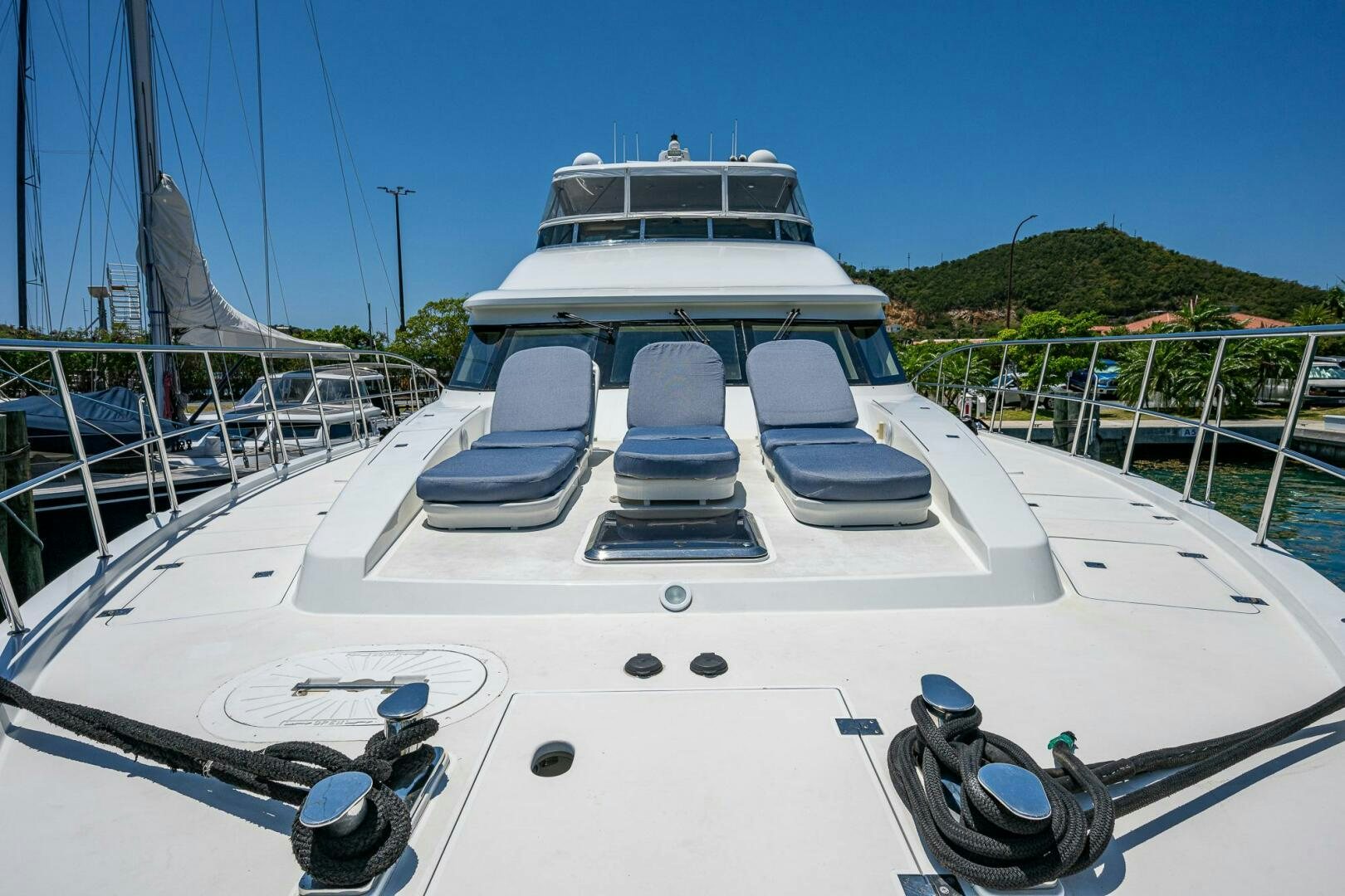 a white yacht with a blue sky aboard LADY LORRAINE Yacht for Sale