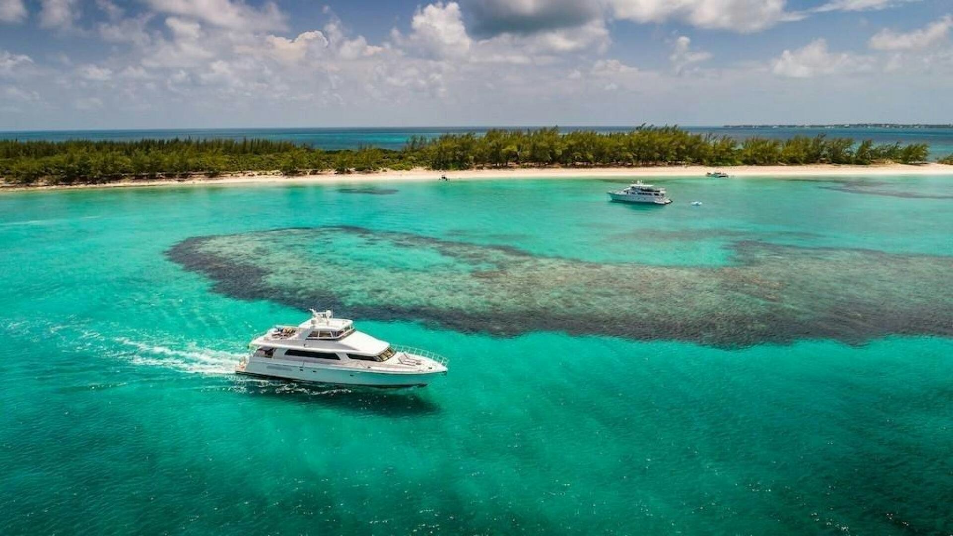 a couple of boats in the water aboard LADY LORRAINE Yacht for Sale