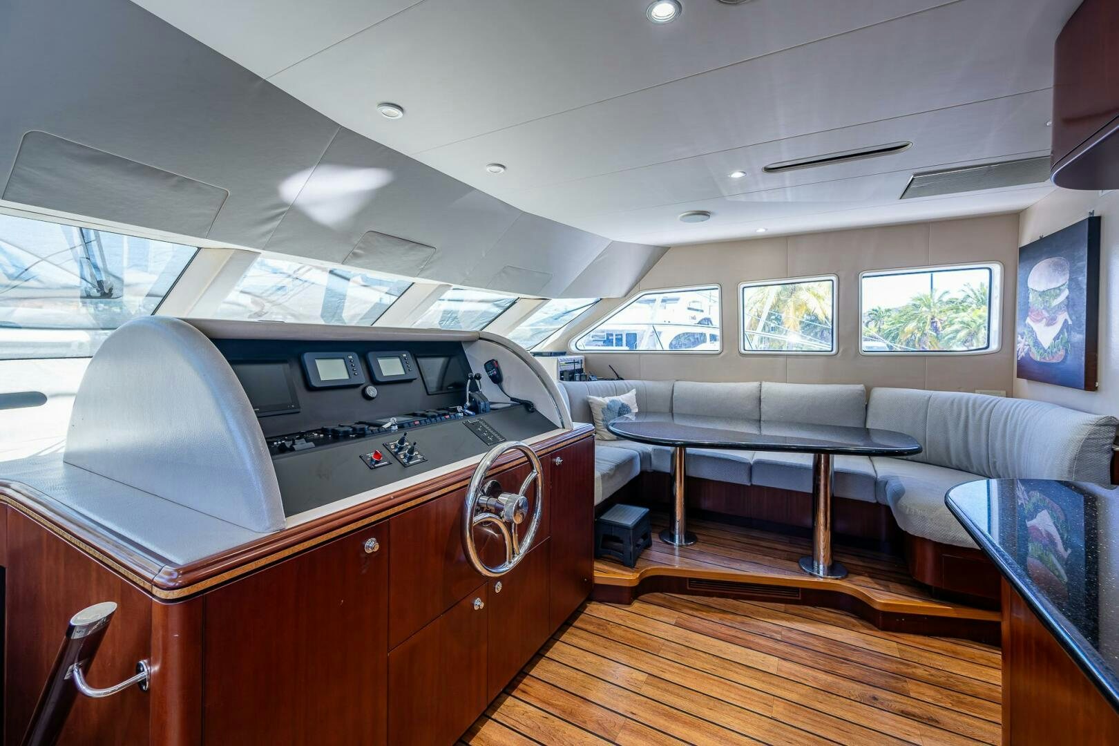 a kitchen with a couch and a table aboard LADY LORRAINE Yacht for Sale