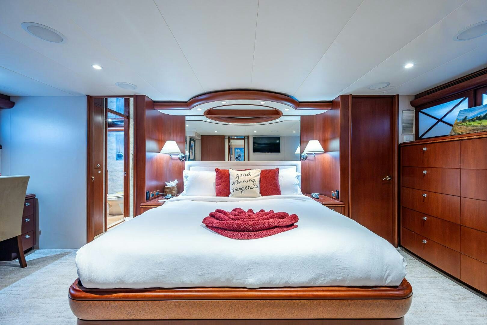 a large bed in a hotel room aboard LADY LORRAINE Yacht for Sale