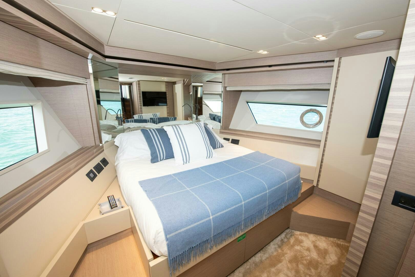 a room with a bed and a window aboard GIULIA Yacht for Sale