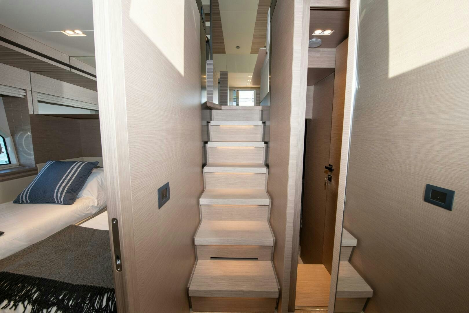a staircase with a white railing aboard GIULIA Yacht for Sale