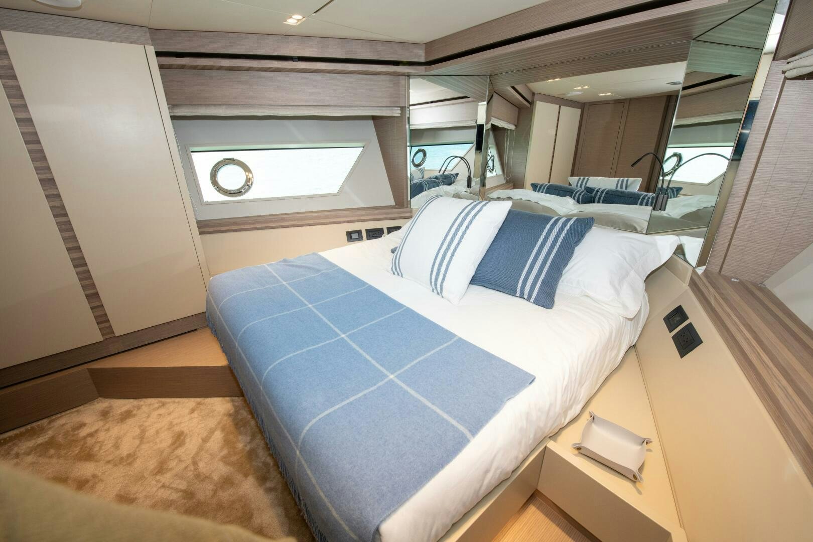 a room with a bed and a window aboard GIULIA Yacht for Sale