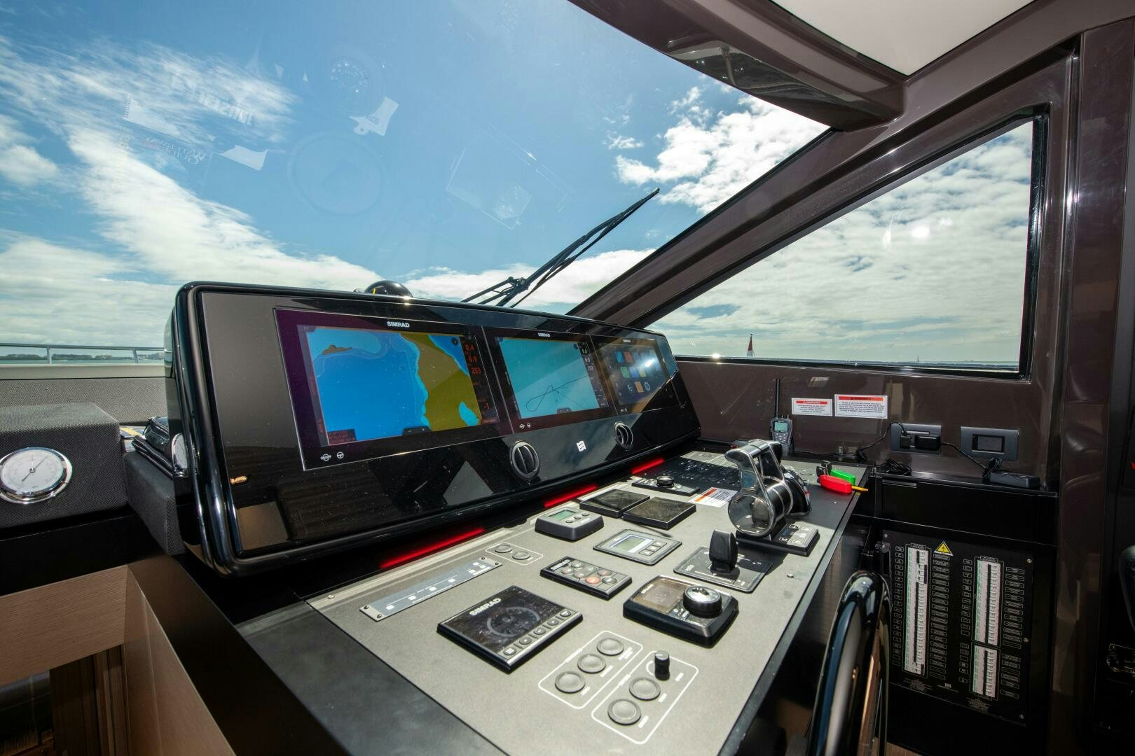 a control panel in a cockpit aboard GIULIA Yacht for Sale