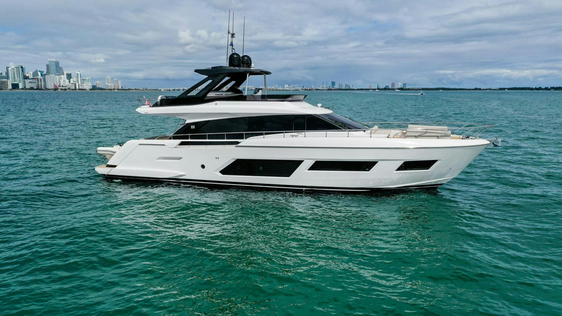 a white yacht in the water aboard GIULIA Yacht for Sale