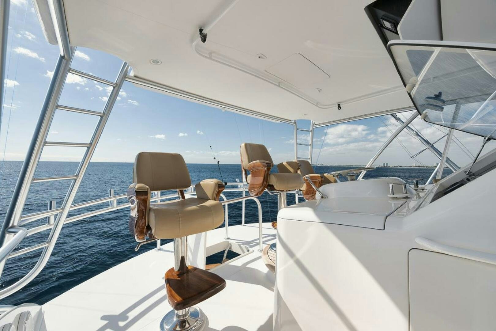 a boat with a chair on the front aboard SWEETUMS Yacht for Sale