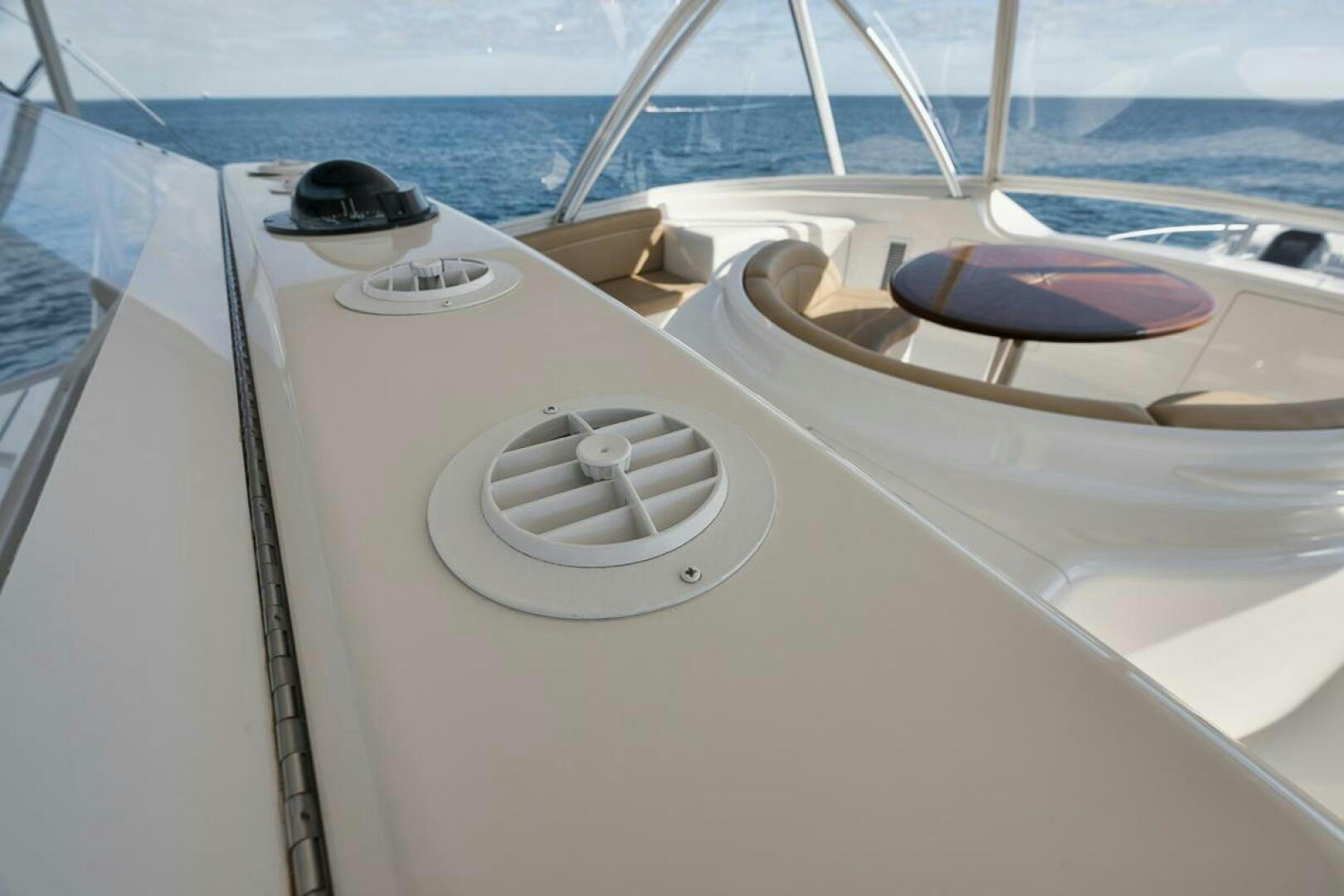 a boat with a steering wheel aboard SWEETUMS Yacht for Sale