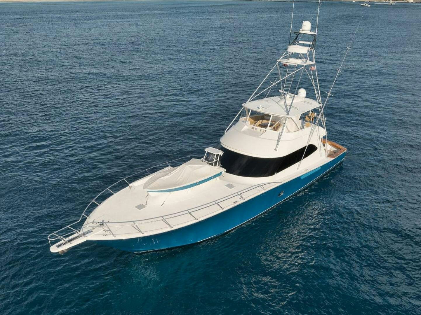 a white boat in the water aboard SWEETUMS Yacht for Sale