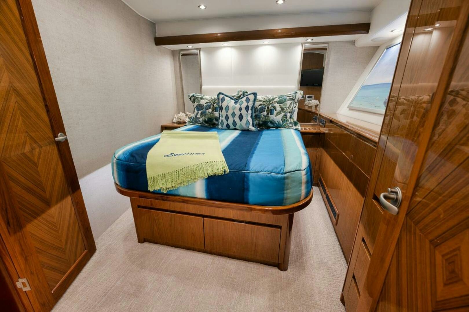 a bed in a room aboard SWEETUMS Yacht for Sale