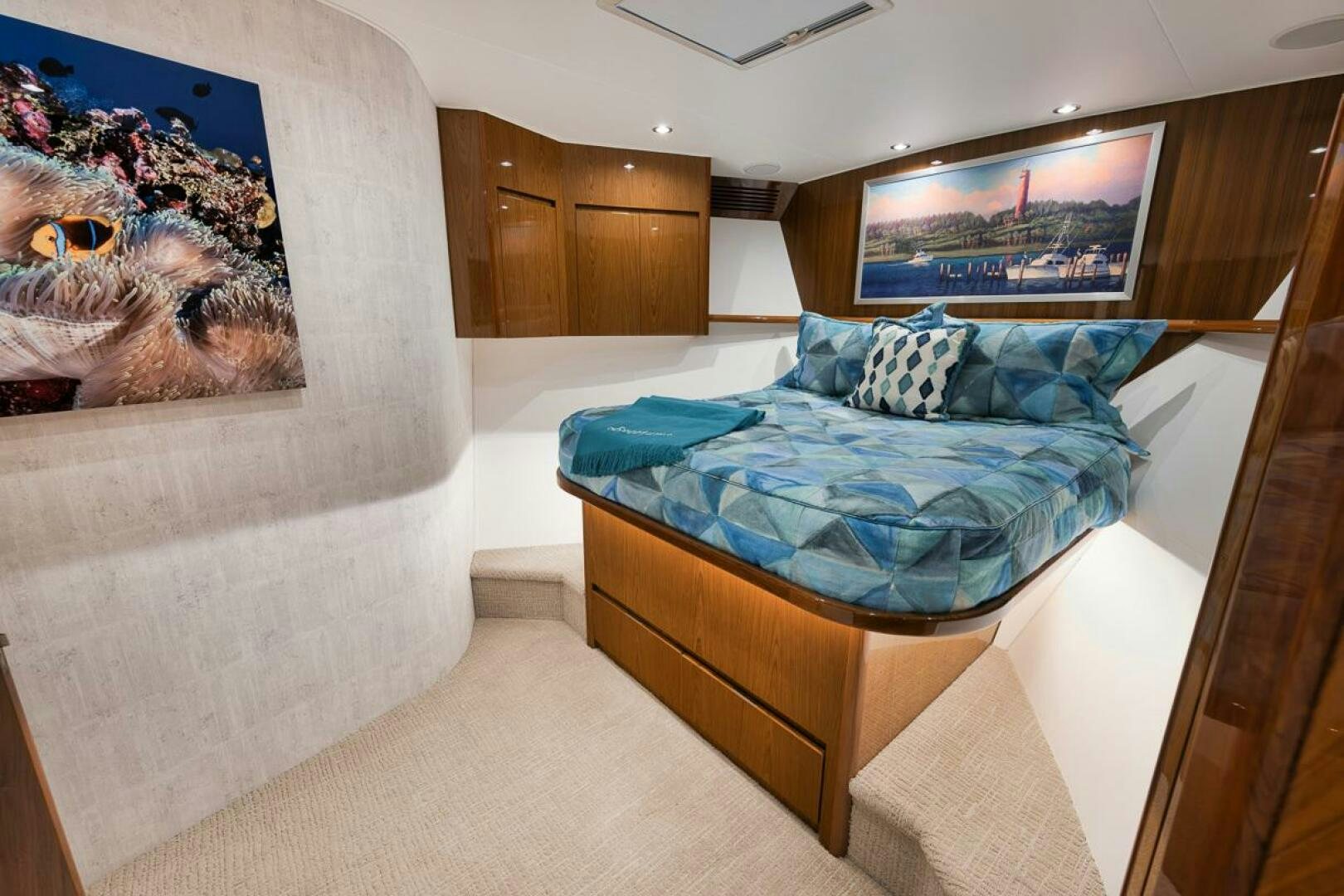 a bed in a room aboard SWEETUMS Yacht for Sale