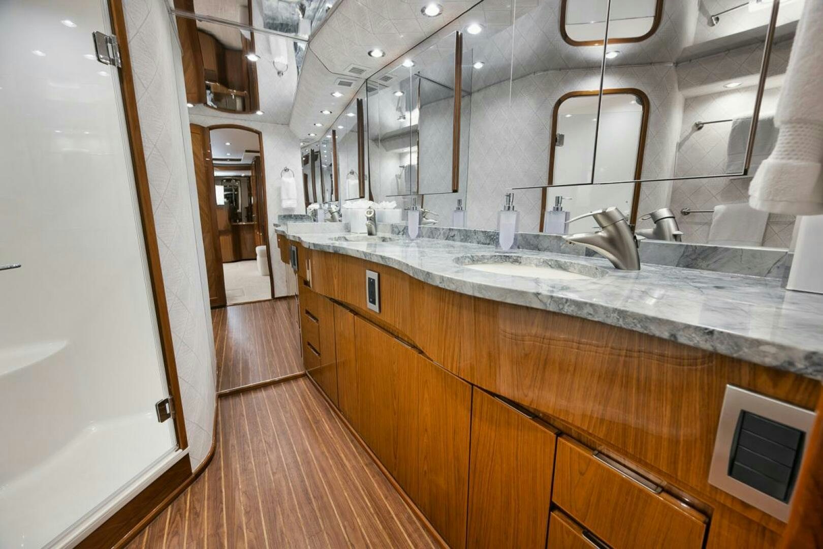 a large kitchen with marble counters aboard SWEETUMS Yacht for Sale