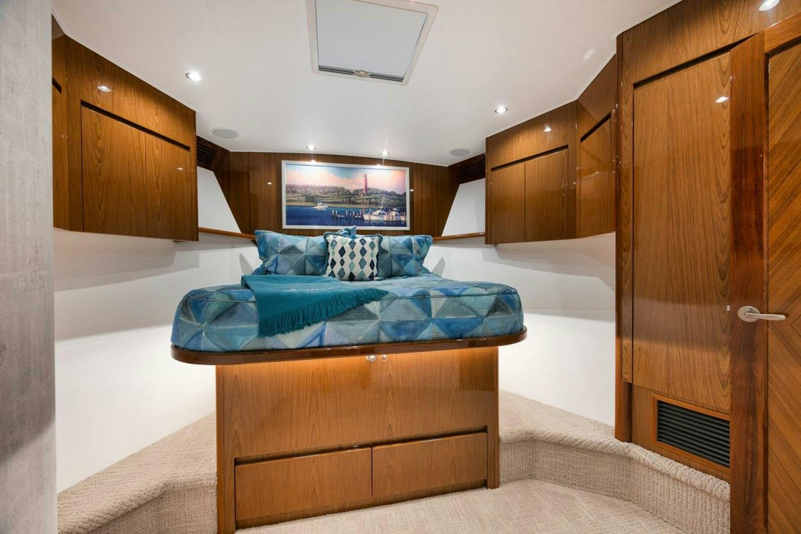 a bed in a room aboard SWEETUMS Yacht for Sale