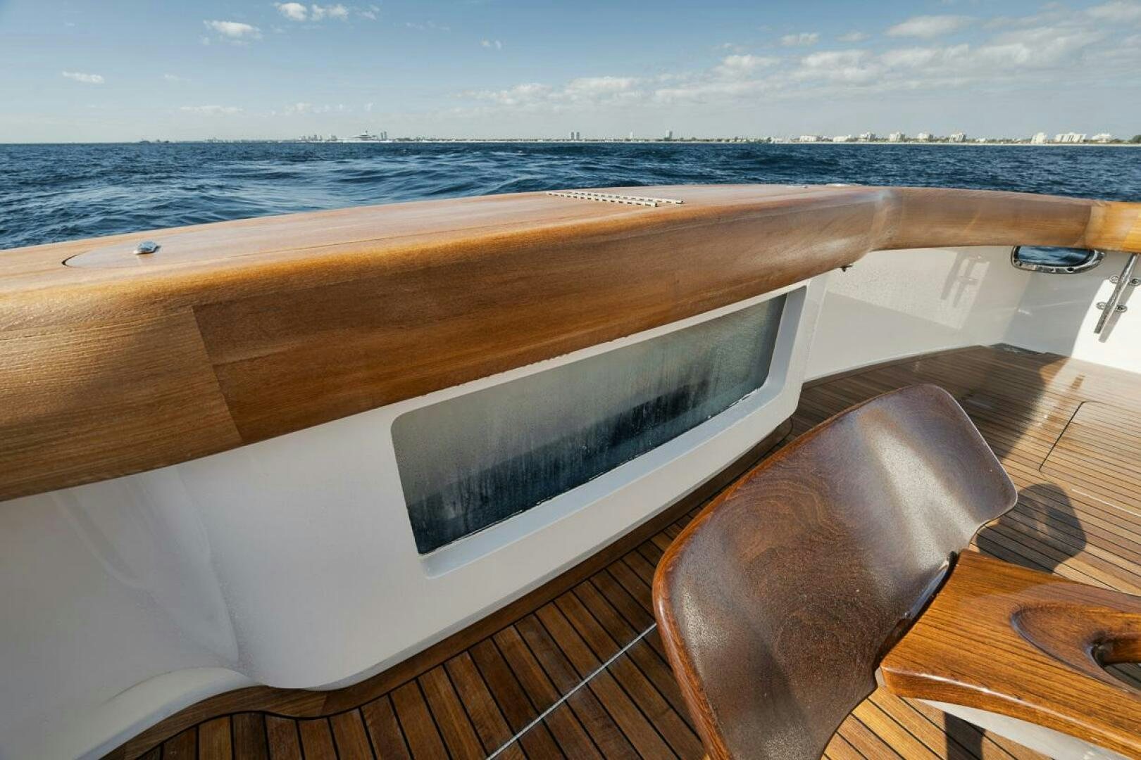 a deck overlooking the ocean aboard SWEETUMS Yacht for Sale