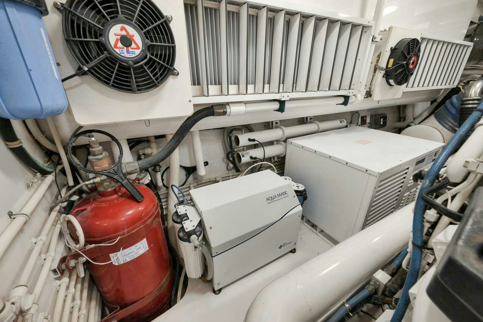 a machine with a red bucket aboard SWEETUMS Yacht for Sale