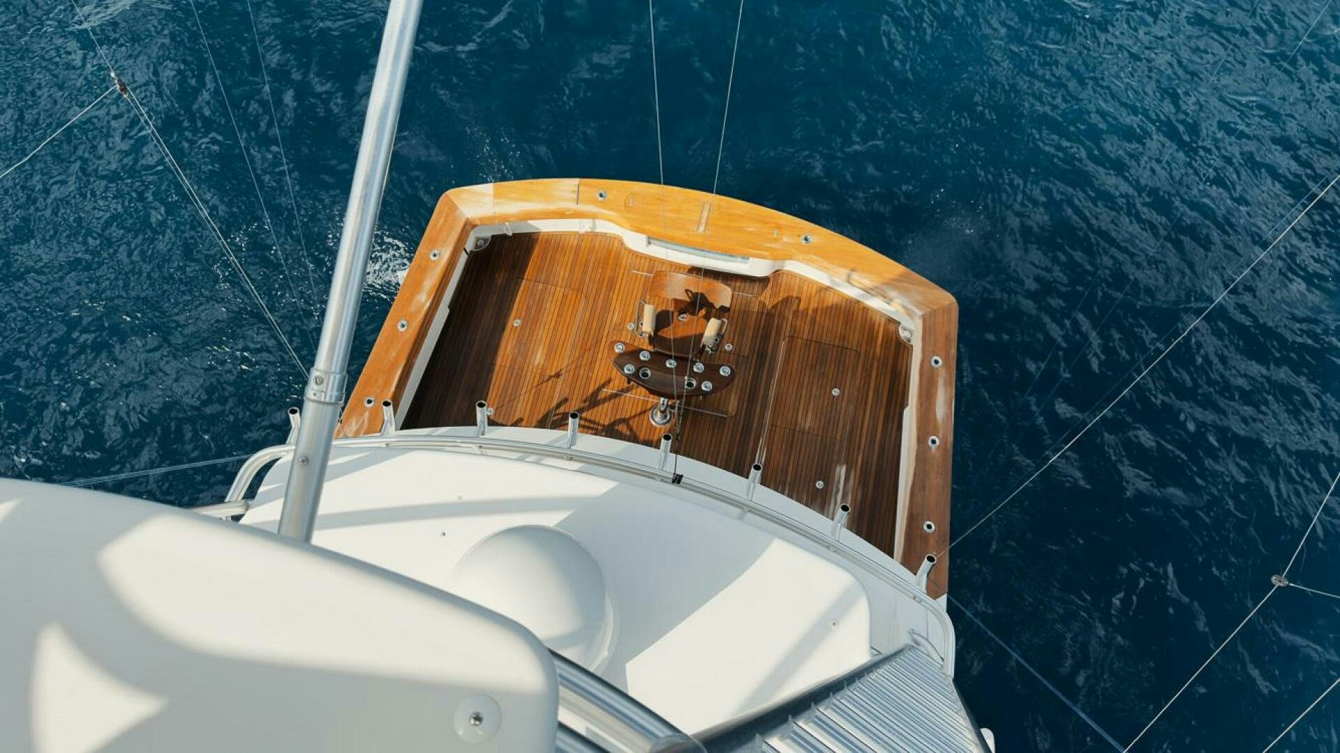 a bathtub with a wooden cabinet aboard SWEETUMS Yacht for Sale