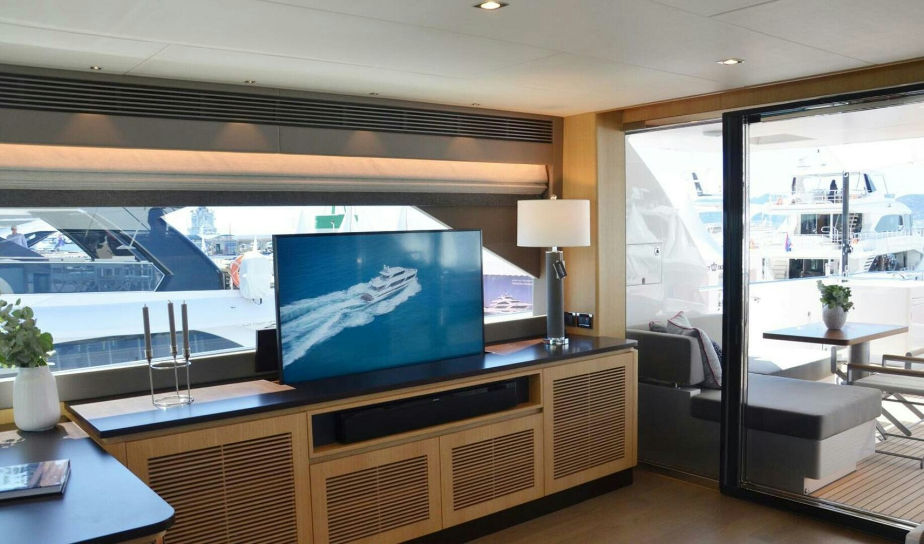 a room with a large screen aboard ICE Yacht for Sale