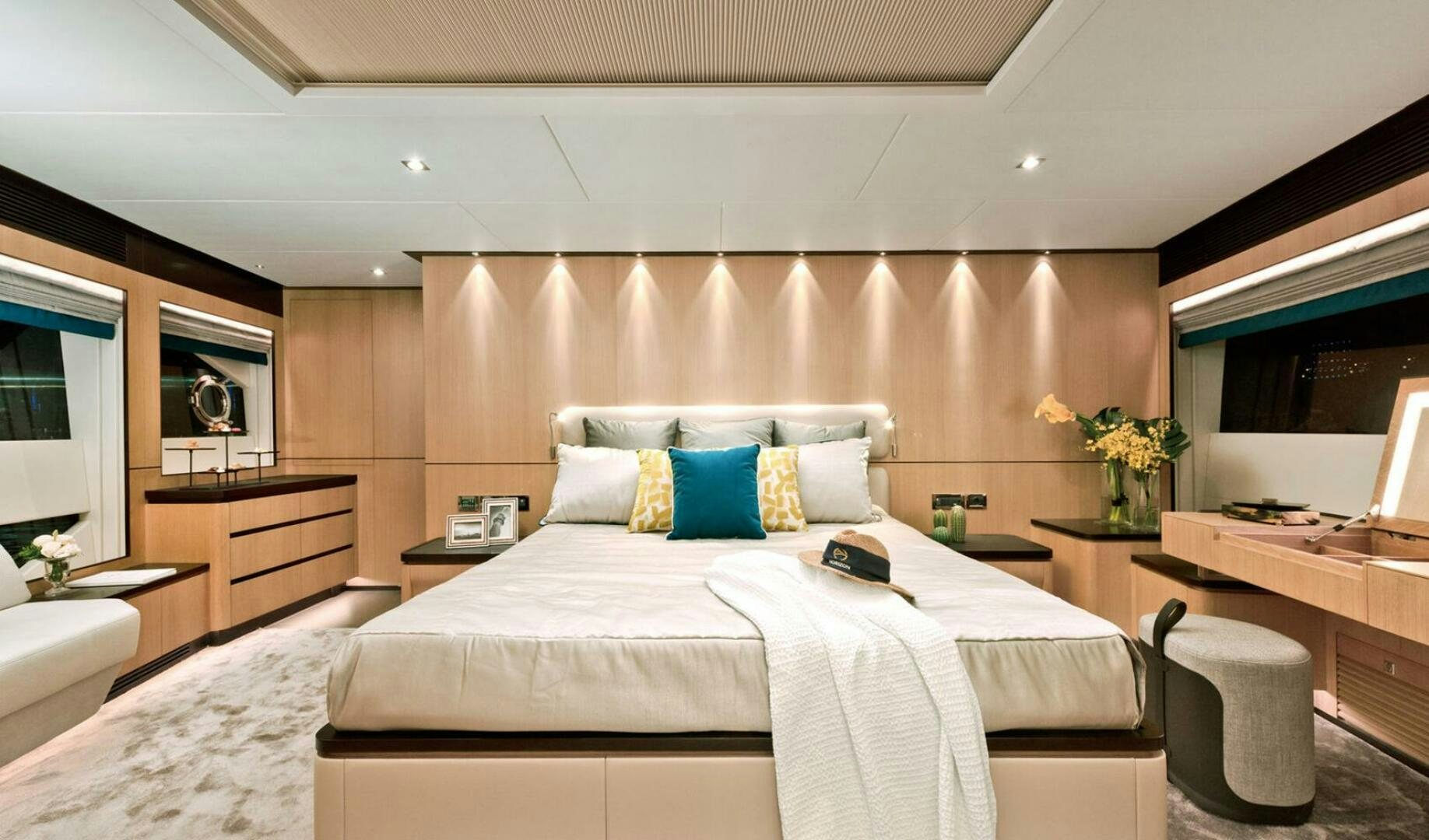 a bed in a hotel room aboard ICE Yacht for Sale