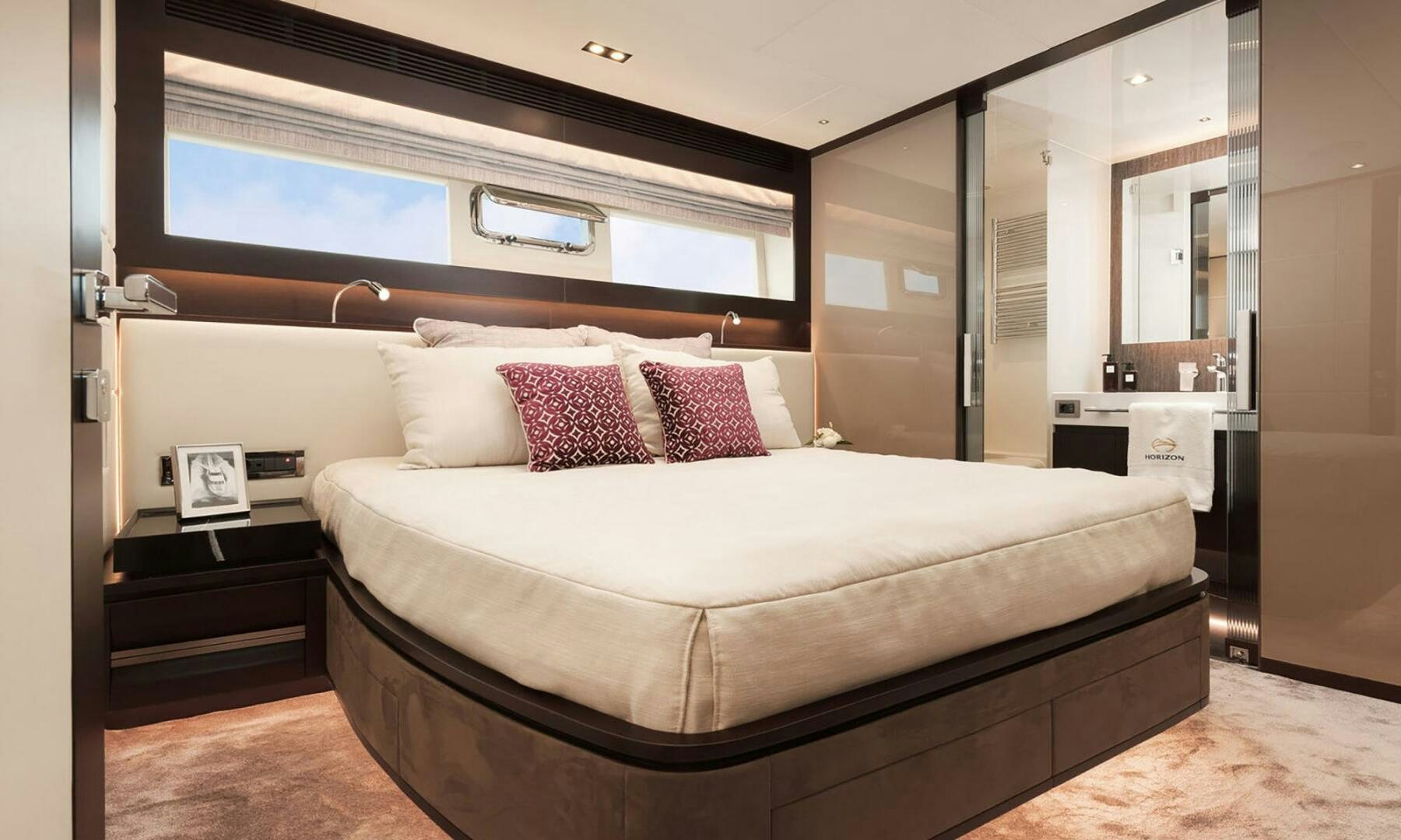 a bed in a room aboard ICE Yacht for Sale