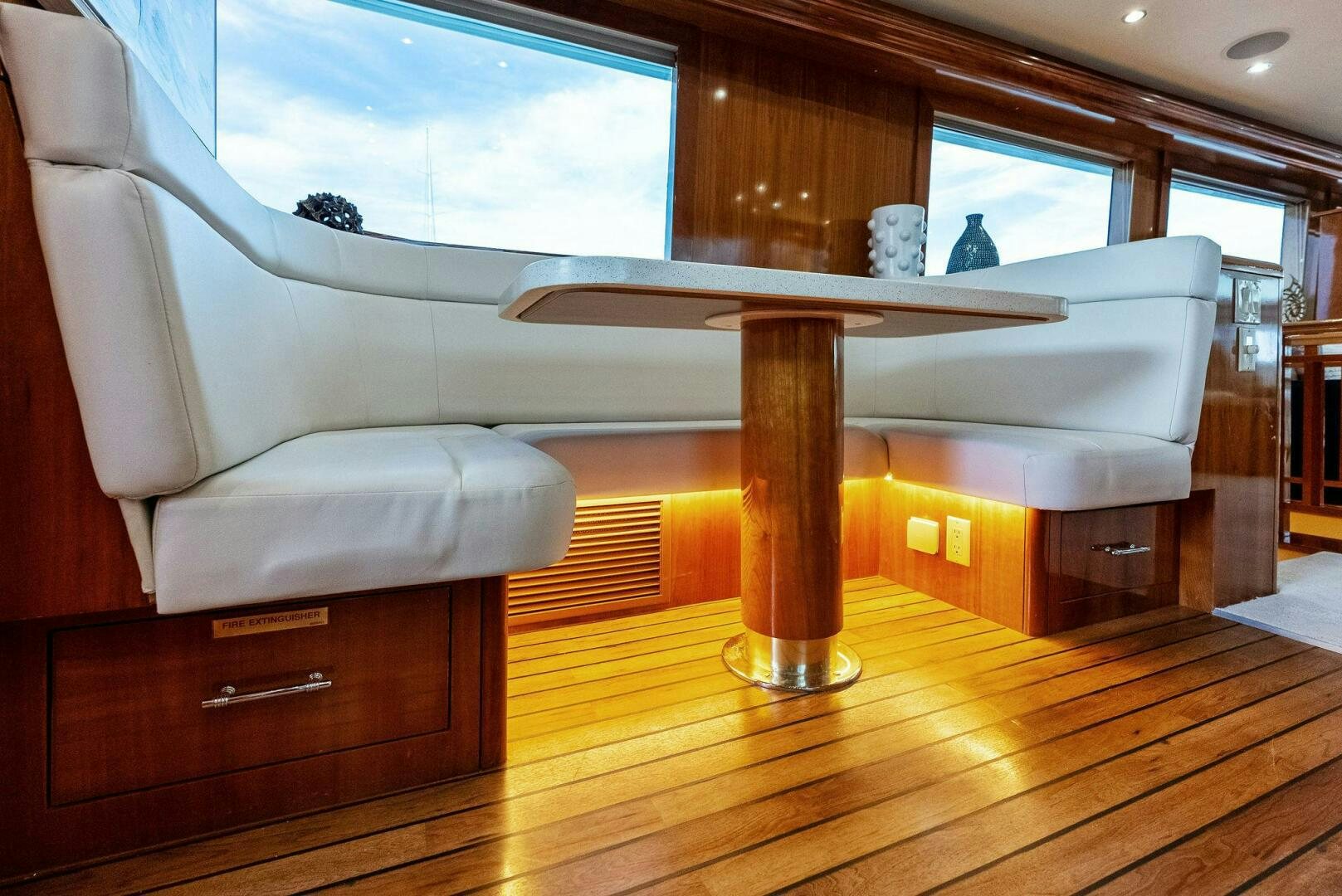 a table with a chair aboard TOUCH N GO Yacht for Sale