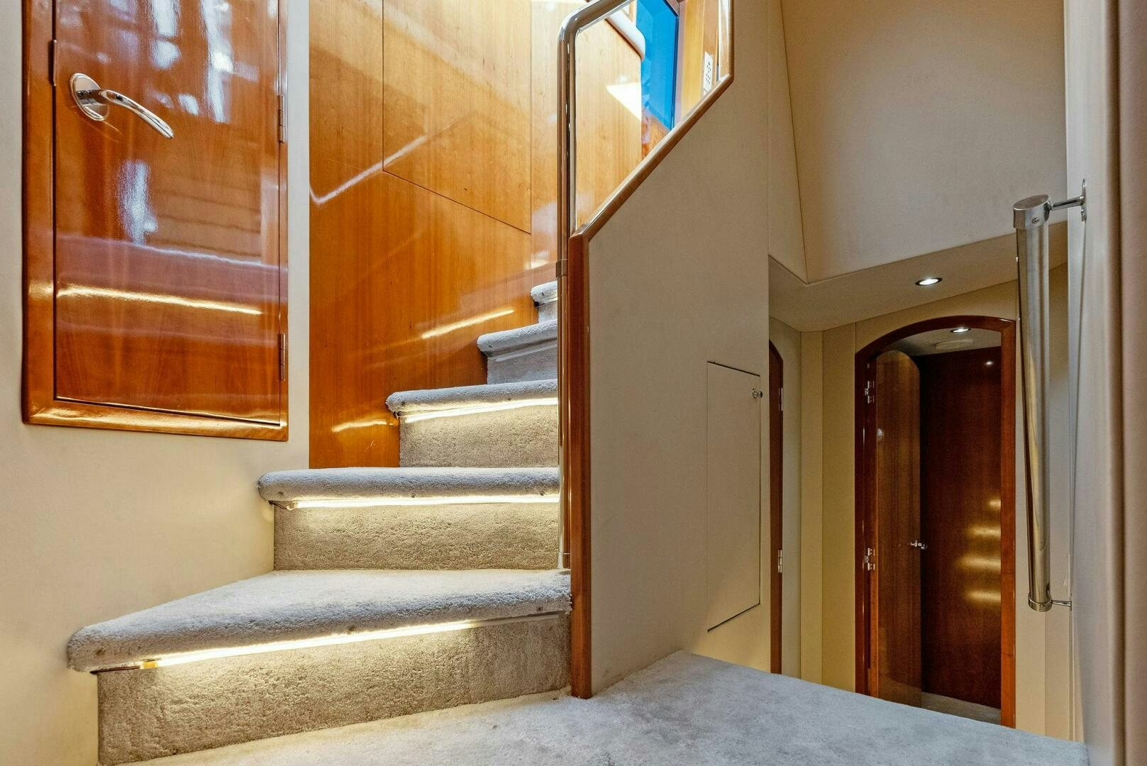 a staircase in a room aboard TOUCH N GO Yacht for Sale