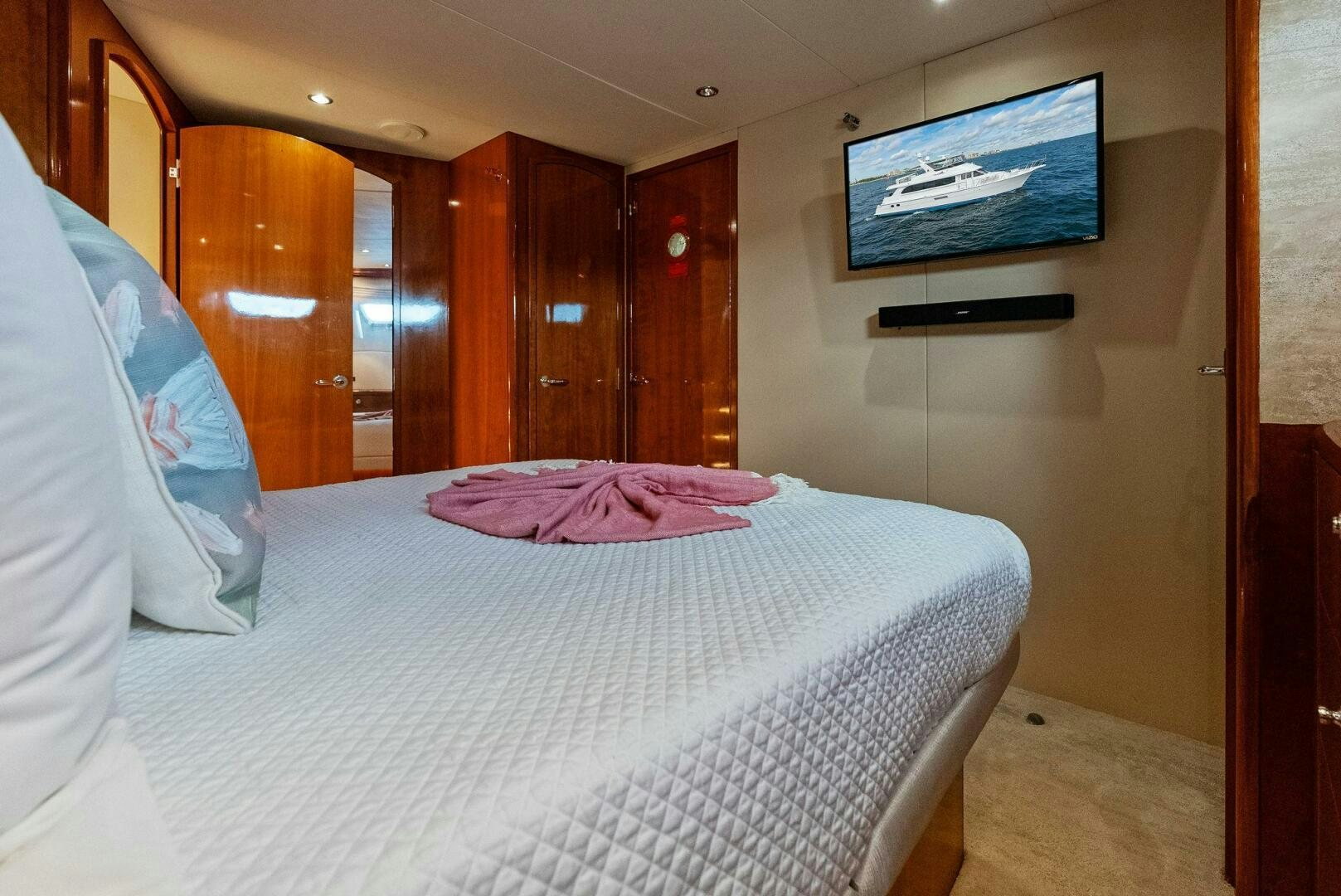 a hotel room with a bed aboard TOUCH N GO Yacht for Sale