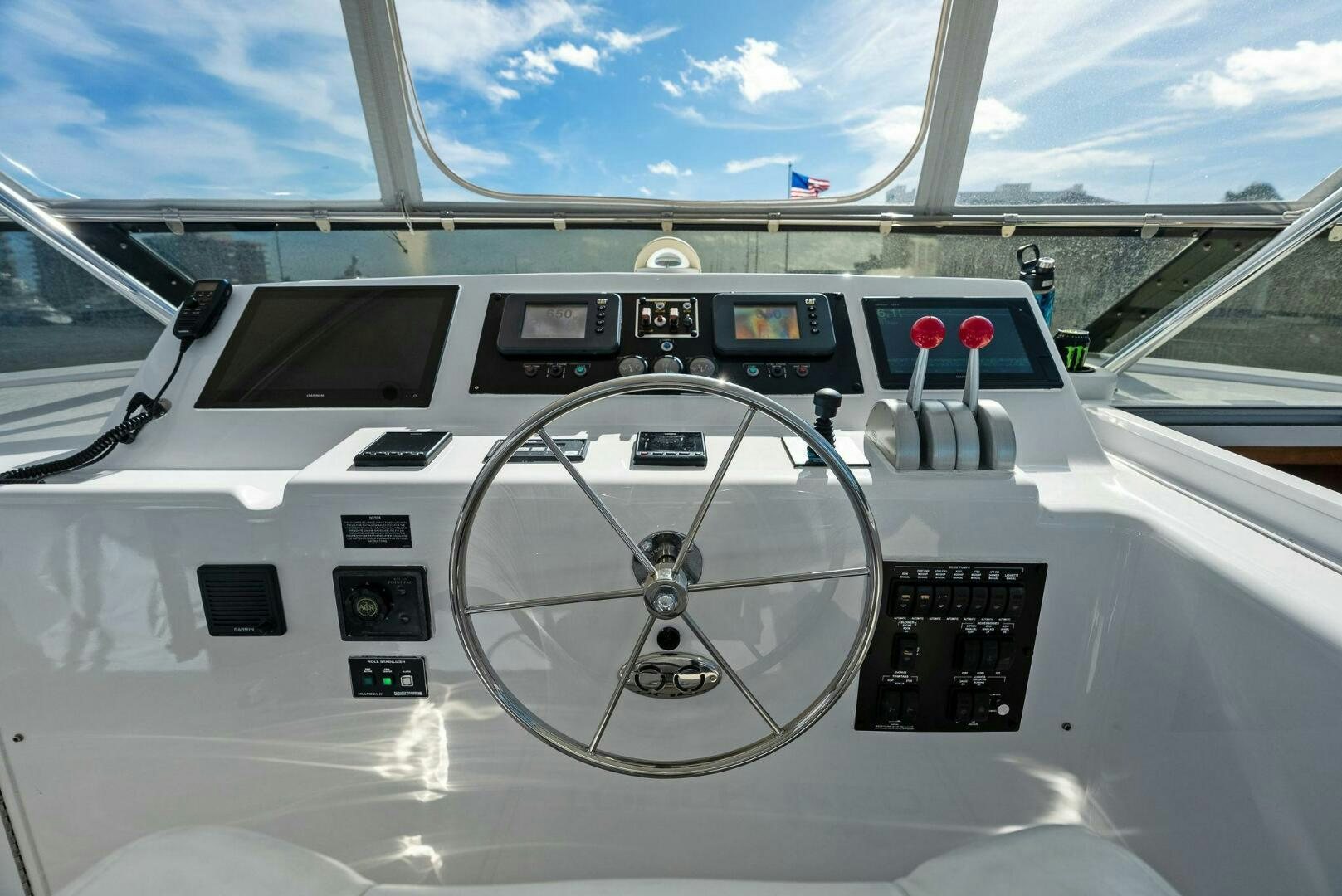 the inside of a white car aboard TOUCH N GO Yacht for Sale