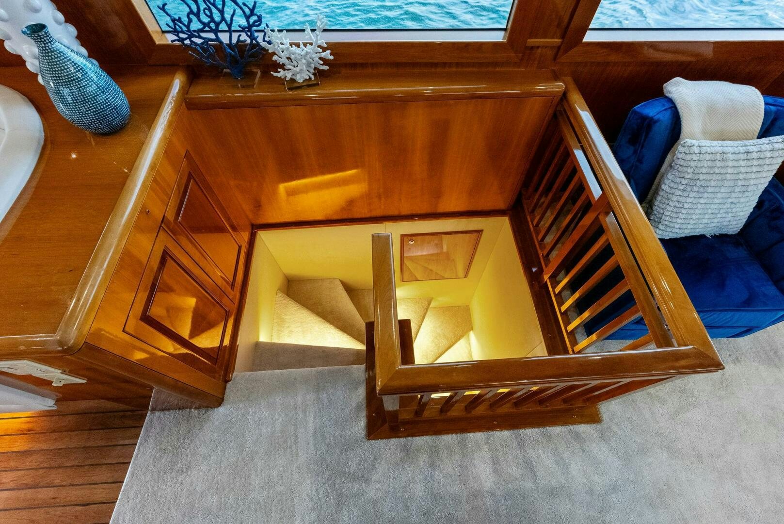 a wooden cabinet with drawers aboard TOUCH N GO Yacht for Sale