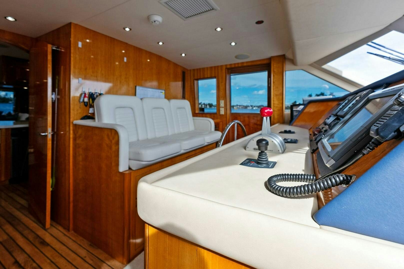 a room with a bed and a desk aboard TOUCH N GO Yacht for Sale