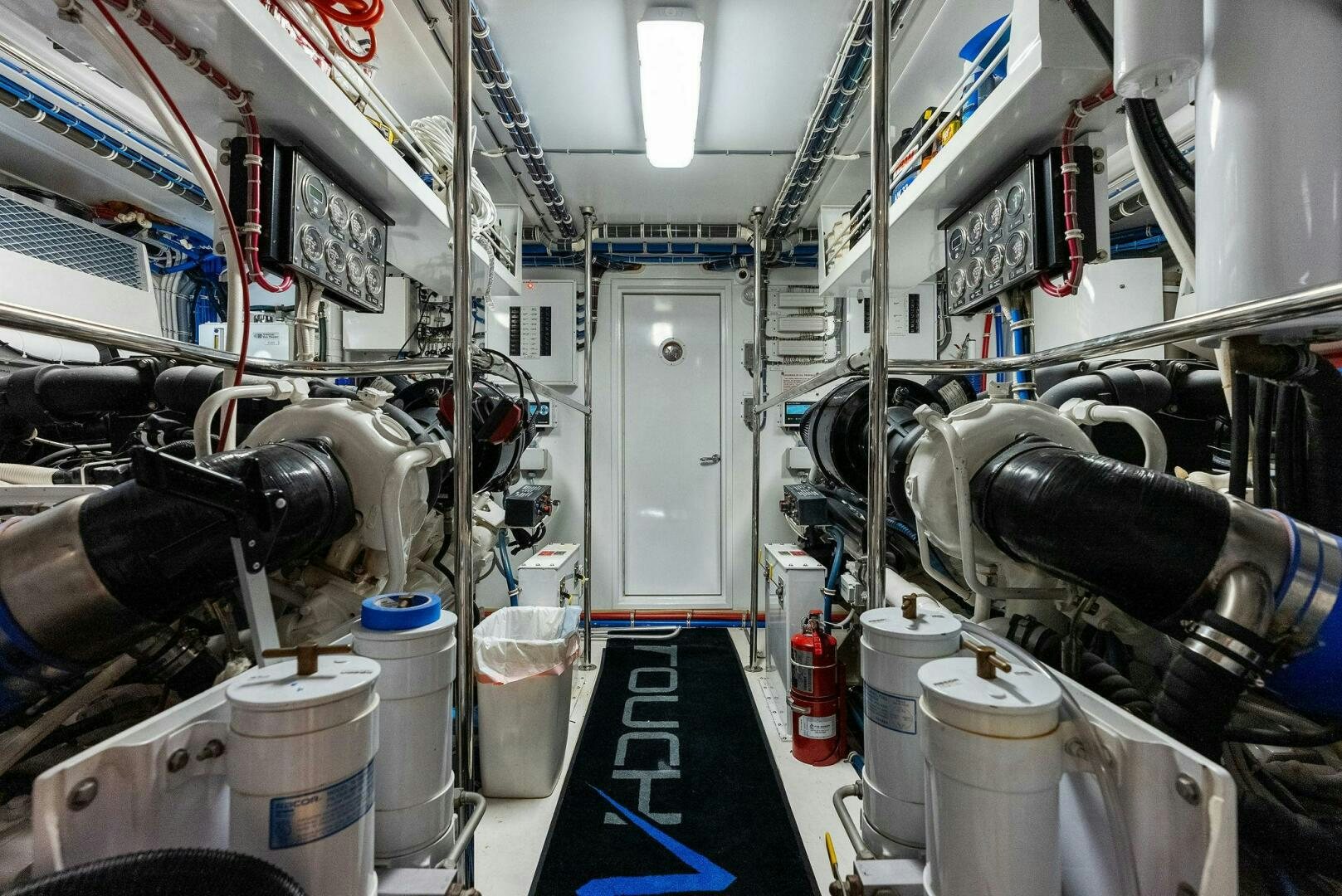 a room with machinery aboard TOUCH N GO Yacht for Sale