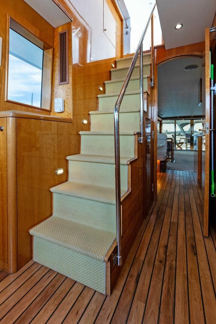 a staircase in a house aboard TOUCH N GO Yacht for Sale