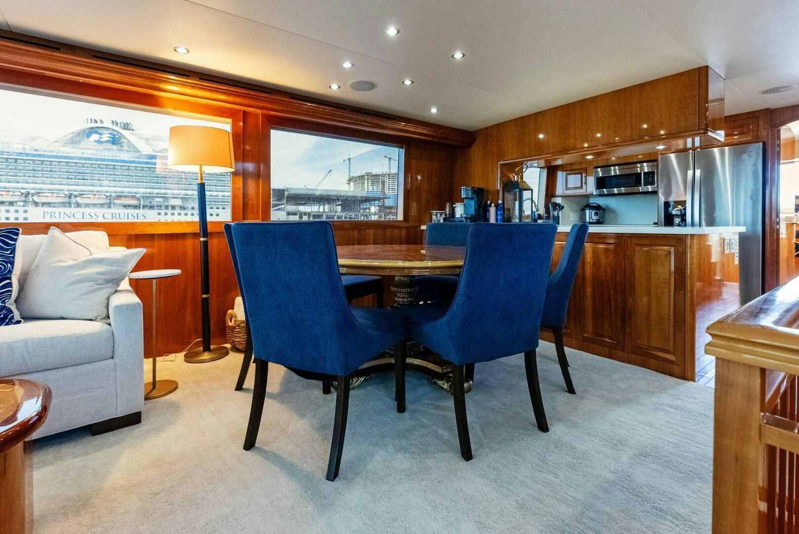 a kitchen and living room aboard TOUCH N GO Yacht for Sale