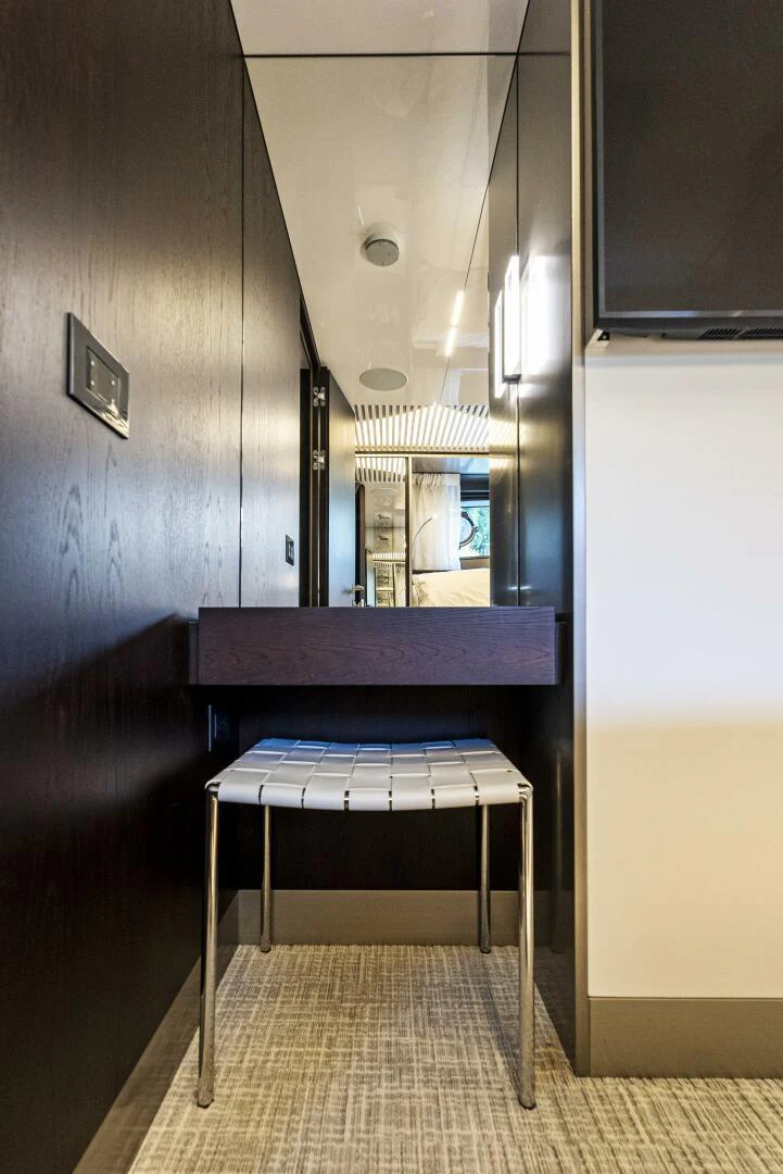 a table with a mirror above it aboard PINCH ME Yacht for Sale