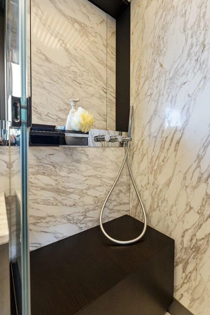 a black shelf with wires and a white object on it aboard PINCH ME Yacht for Sale