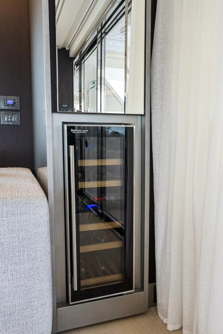 a glass door with a window aboard PINCH ME Yacht for Sale