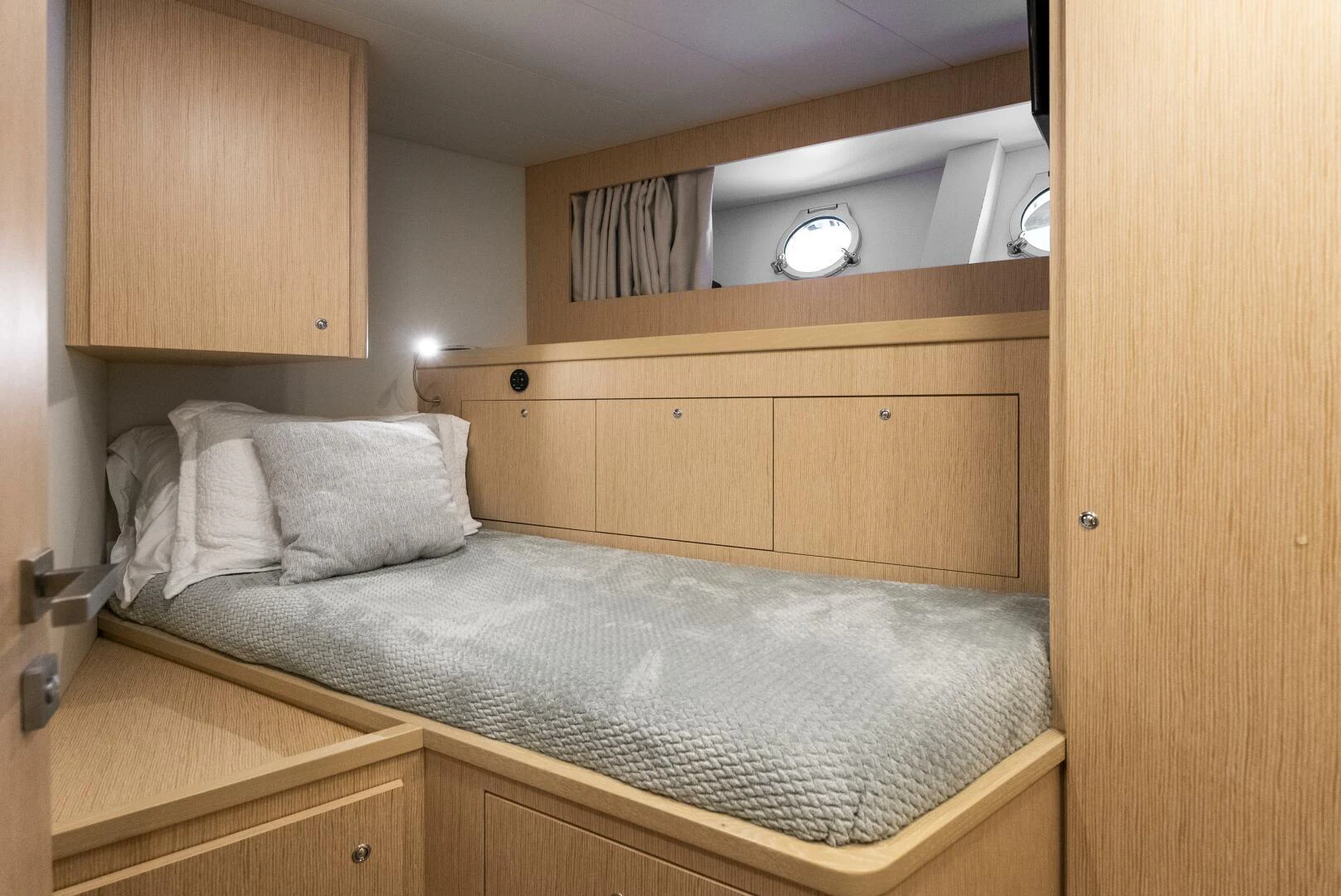 a bed with white sheets aboard PINCH ME Yacht for Sale