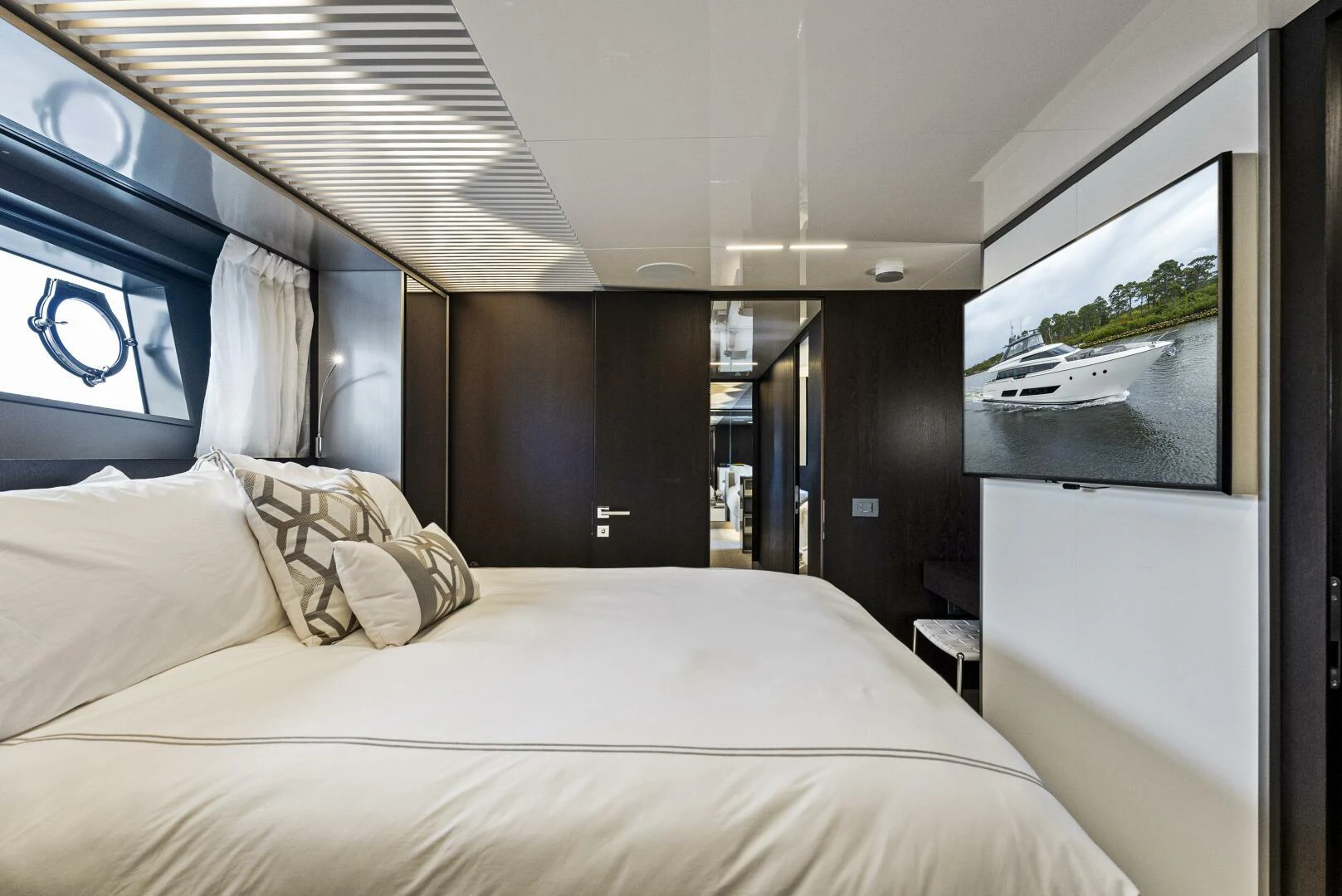 a bed with white sheets aboard PINCH ME Yacht for Sale