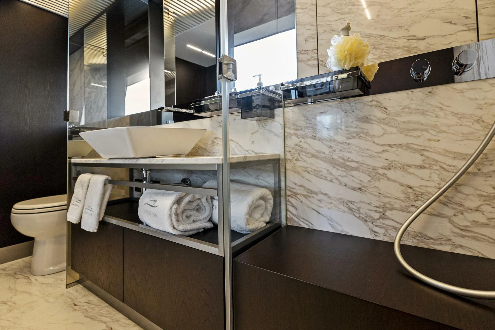 a bathroom with a sink and toilet aboard PINCH ME Yacht for Sale
