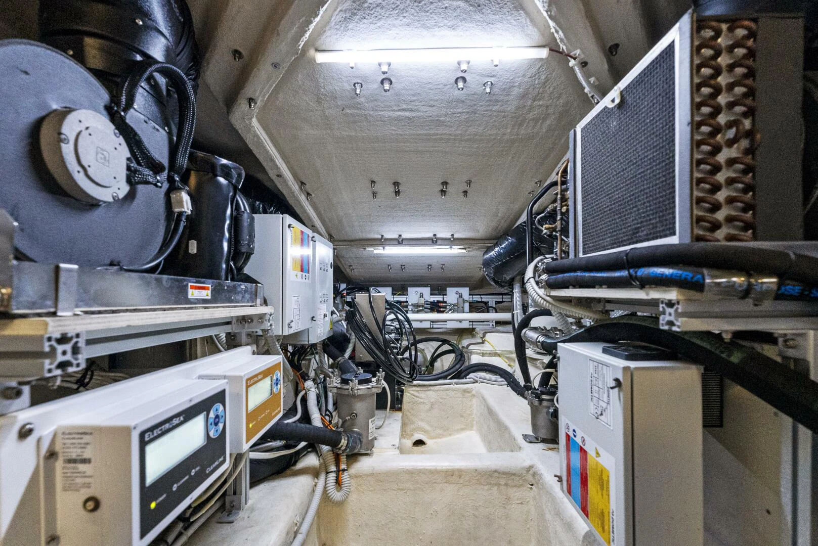 a room with machinery and equipment aboard PINCH ME Yacht for Sale