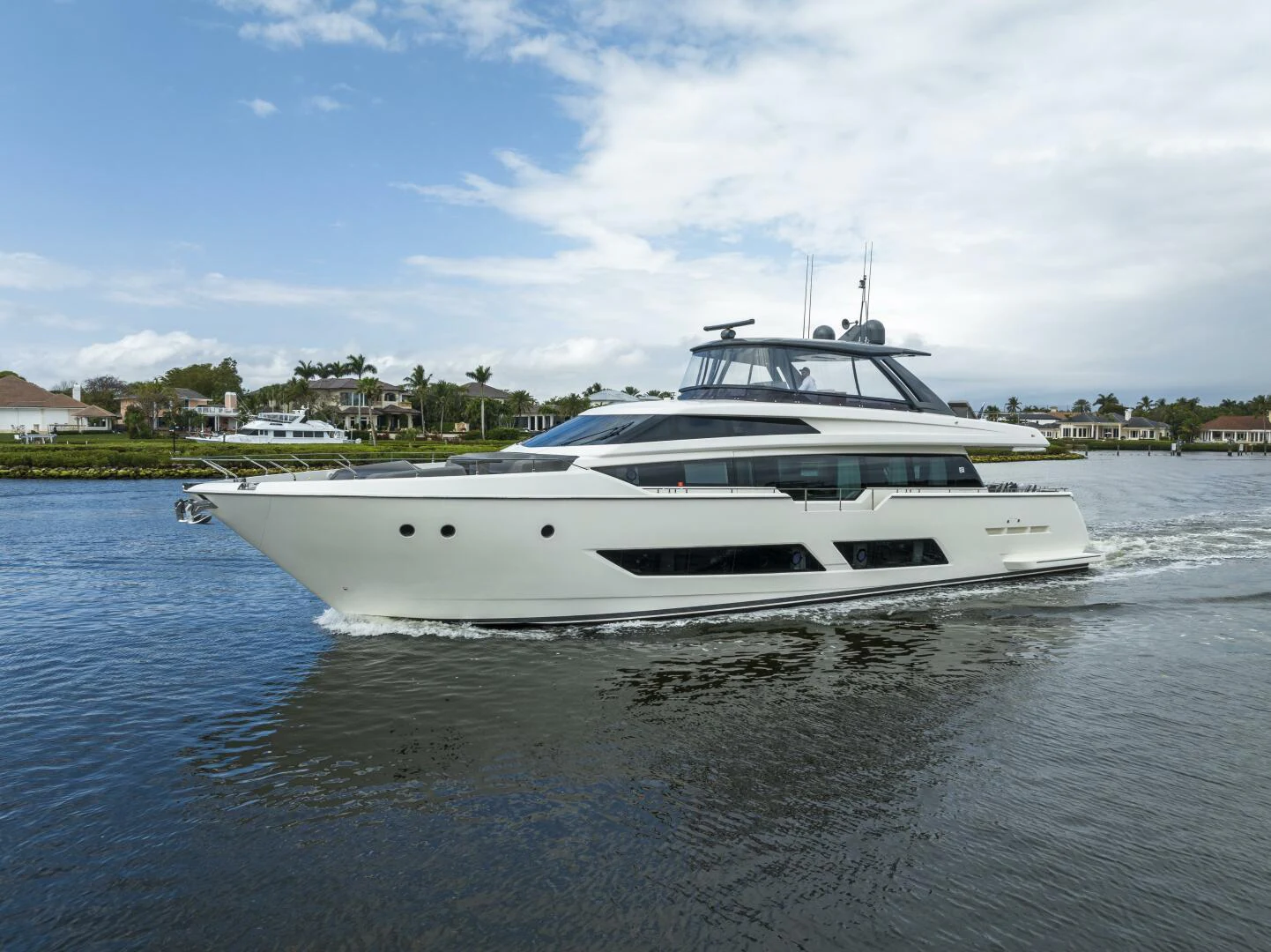 a white yacht in the water aboard PINCH ME Yacht for Sale