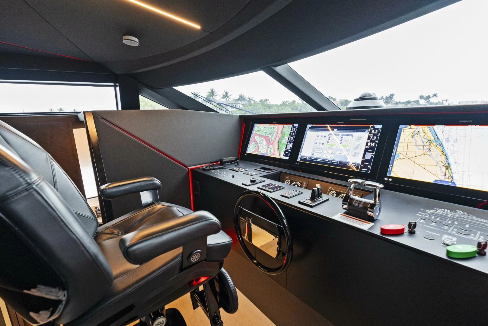 a vehicle with multiple monitors aboard PINCH ME Yacht for Sale