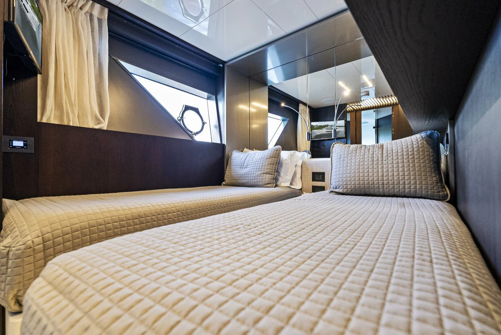 a bed with a white sheet aboard PINCH ME Yacht for Sale