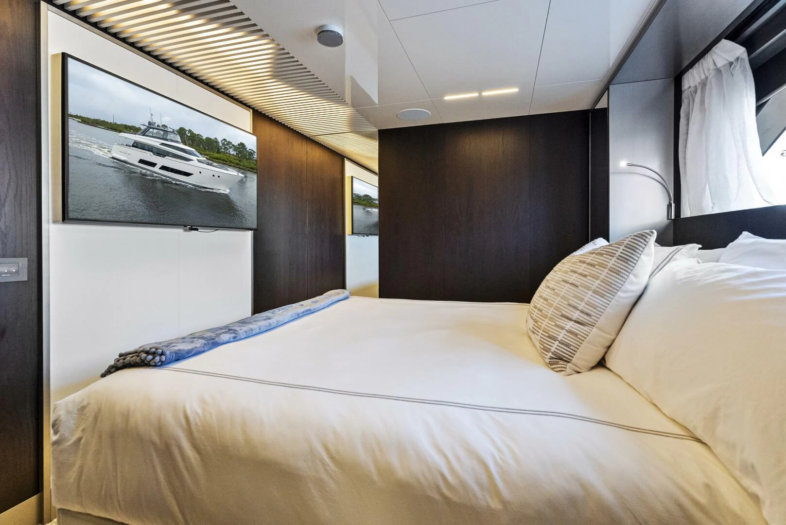 a bed with white sheets aboard PINCH ME Yacht for Sale