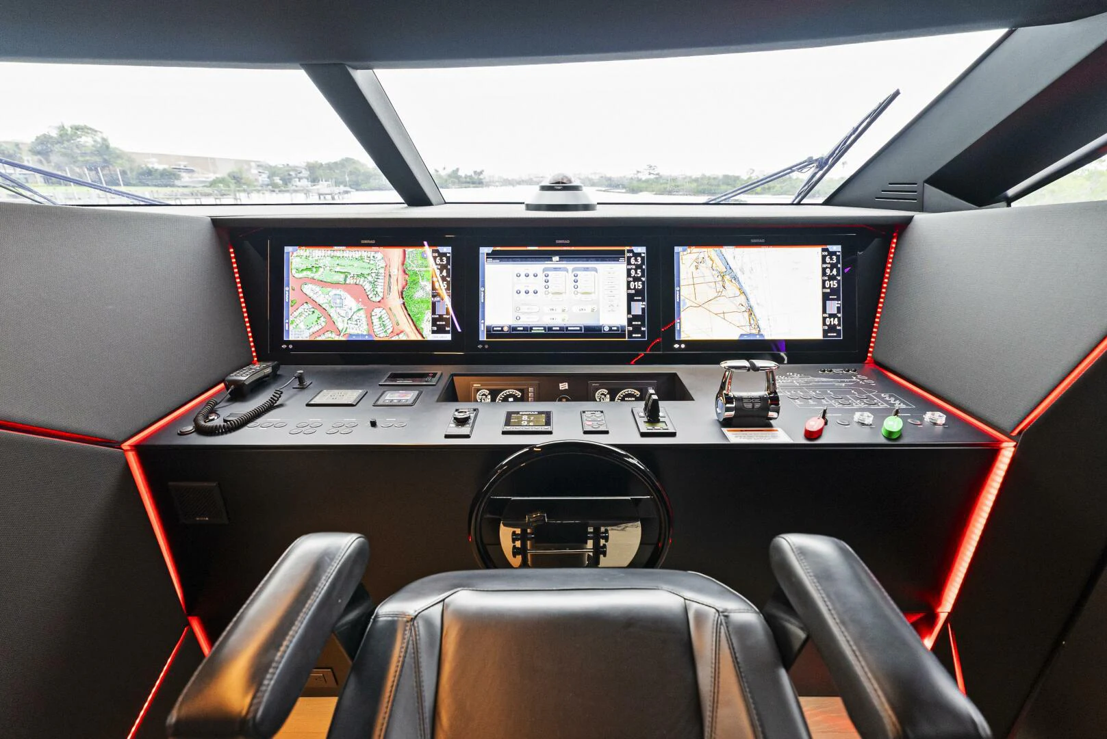 inside of a car with monitors and seats aboard PINCH ME Yacht for Sale
